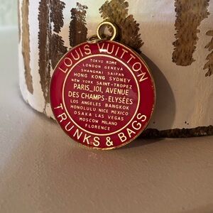 ❤️💛… Louis Vuitton Red and Gold “Trunks and Bags” Medallion Style Charm